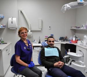 Dentist with patient at the Central Dental Surgery